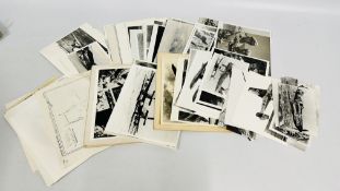 A FOLDER CONTAINING A GROUP OF VINTAGE BLACK AND WHITE PRESS PHOTOS MAINLY AIRCRAFT.