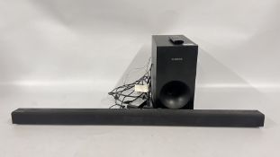 A SAMSUNG SOUND BAR MODEL HWJ355 AND SUBWOOFER, REMOTE AND VARIOUS LEADS - SOLD AS SEEN.