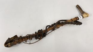 A VINTAGE BAMBOO & HORN HANDLED RIDING CROP SILVER BANDING WITH A WOVEN / BRAIDED LEATHER WHIP.