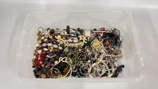 A LARGE TUB CONTAINING AN EXTENSIVE GROUP OF COSTUME JEWELLERY, BEADED NECKLACES, WATCHES,