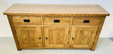 A MODERN SOLID LIGHT OAK DRESSER BASE, THE THREE DRAWERS ABOVE THREE CUPBOARD DOORS, W 160CM,