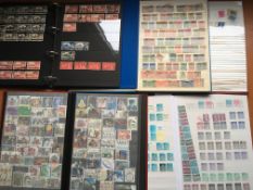 STAMPS: BOX WITH GREAT BRITAIN IN FIVE VARIOUS VOLUMES.