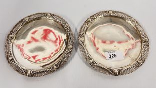A PAIR OF WHITE METAL CIRCULAR SALVERS WITH OPEN WORK SWAG RIMS, DIAMETER 16CM.