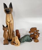 A GROUP OF HAND CARVED CAT SCULPTURE AND BIRDS + A BRONZED CAT.
