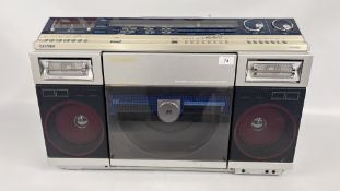 A VINTAGE SHARP STEREO SYSTEM MODEL V2-2000, W 73CM X H 46CM - SOLD AS SEEN.