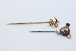 A VINTAGE YELLOW METAL STICK PIN SET WITH SMALL SEED PEARLS + ONE OTHER PRESENTED IN A VINTAGE H.L.