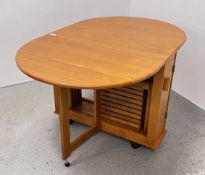 MODERN BEECHWOOD FINISH FOLDING TABLE WITH 4 FOLDING CHAIRS.