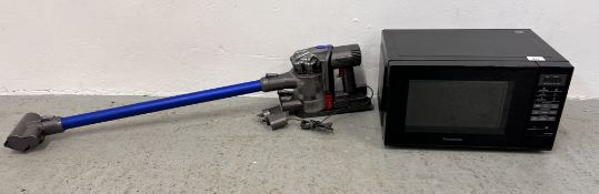 A PANASONIC MICROWAVE OVEN AND DYSON DC44 ANIMAL CORDLESS VACUUM CLEANER WITH CHARGER AND DOCK -