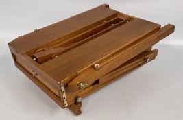 WOODEN TRAVEL EASEL (A/F) ALONG WITH HELD PAINTS AND PAINT BRUSHES.