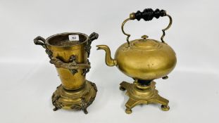 A VINTAGE BRASS KETTLE AND STAND + A VINTAGE ORIENTAL BRASS TWO HANDLED URN DEPICTING A RELIEF
