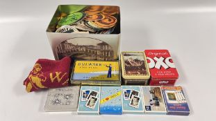 A BOX OF ASSORTED BEER MATS & PLAYING CARDS + A VINTAGE TIN MARKED 