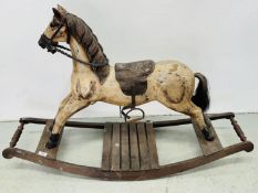 A REPRODUCTION ROCKING HORSE, HEIGHT 80CM.