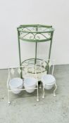 A METAL CRAFT TWO TIER DRINKS STAND ALONG WITH TWO METAL CRAFT CHAIR DESIGN PLANTERS.