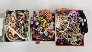 THREE BOXES CONTAINING AN EXTENSIVE GROUP OF ASSORTED COSTUME JEWELLERY BEADED NECKLACES, BANGLES,