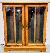 PINE AND GLAZED DVD CABINET.