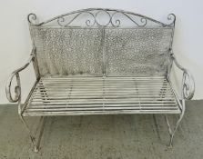 A MODERN ANTIQUE EFFECT METAL CRAFT GARDEN BENCH, WIDTH 106CM.