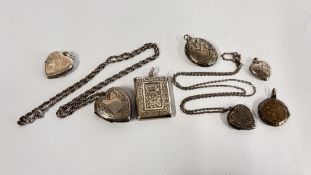 A GROUP OF 7 VINTAGE SILVER LOCKETS SOME WITH CHAINS.