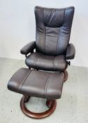 A DARK TAN LEATHER STRESSLESS REVOLVING RELAXER CHAIR ALONG WITH MATCHING FOOTSTOOL.