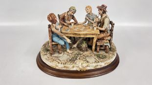 A LARGE CAPO DI MONTE PORCELAIN FIGURE OF TWO BOYS CHEATING AT CARDS, BY BRUNO MERLI,
