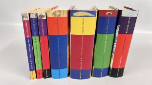 A GROUP OF SEVEN HARRY POTTER BOOKS TO INCLUDE FIRST EDITIONS.