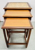 A NEST OF THREE MID CENTURY OCCASIONAL TABLES (THE LARGER EXAMPLE TILED TOP).