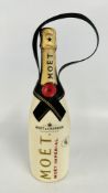 A MOET & CHANDON IMPERIAL BRUT CHAMPAGNE BOTTLE PRESENTED IN A SPECIAL ISOTHERMAL DIAMOND SUIT