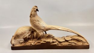AN ART DECO STYLE CERAMIC PHEASANT STUDY, L 55.5 X H 31CM.