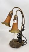 A REPRODUCTION TIFFANY STYLE TWIN BRANCH TABLE LAMP - SOLD AS SEEN.