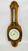 AN OAK MOUNTED ANEROID WALL BAROMETER, THE DIAL MARKED JERMIN & SONS, KINGS LYNN.