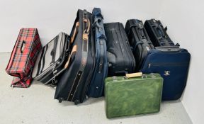 A GROUP OF ASSORTED LUGGAGE CASES.