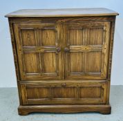 AN ERCOL ENTERTAINMENT TELEVISION CABINET.