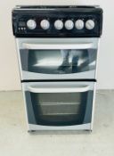 A CANON HOTPOINT SLIM LINE SLOT IN MAINS GAS COOKER WITH DOUBLE OVEN - CONDITION OF SALE: TO BE