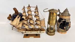 A VINTAGE BRASS MINER'S LAMP MARKED E.