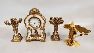 A MODERN DECORATIVE RESIN CLOCK GARNITURE MARKED 