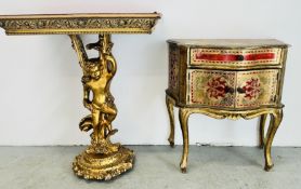 A GILT FINISH OCCASIONAL TABLE THE PEDESTAL DEPICTING A CHERUB H 76CM ALONG WITH AN ORNATE PAINTED