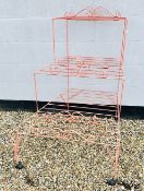 METAL FRAMED WHEELED PLANT STAND.