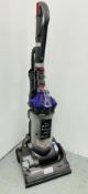 DYSON UPRIGHT VACUUM CLEANER C/W ATTACHMENTS - SOLD AS SEEN.