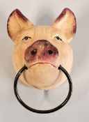 (R) PIG HEAD WITH METAL RING.