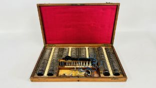 A VINTAGE MAHOGANY CASED OPTOMETRIST'S SET, ORIGINALLY USED AT 