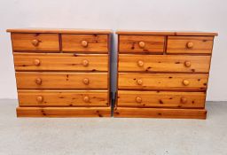 A PAIR OF HONEY PINE 4 DRAWER CHESTS, W 81, D 43, H 74CM.