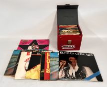 A COLLECTION OF ELVIS PRESLEY SINGLE AND LP'S VARIOUS TITLES.