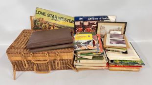 A BOX AND A PICNIC BASKET CONTAINING A QUANTITY OF ASSORTED EPHEMERA TO INCLUDE FOOTBALL RELATED