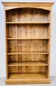 A WAXED PINE 5 TIER BOOKCASE, W 111, D 34, H 183CM.