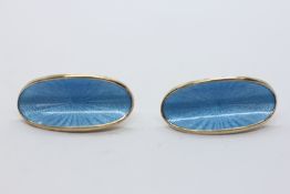 A PAIR OF DAVID ANDERSON NORWEGIAN SILVER GILT AND BABY BLUE ENAMEL CLIP ON EARRINGS.