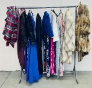 A GROUP OF WOMENS CLOTHING TO INCLUDE EVENING DRESSES AND COATS, FAUX FUR COAT MARKED 