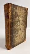 FOX'S BOOK OF MARTYRS BOUND IN WELL WORD HALF CALF WITH HEAVILY SCUFFED BOARDS.