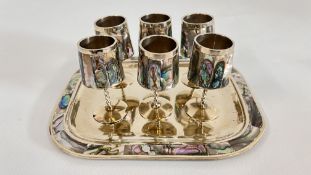 A VINTAGE ABALONE INLAID SET COMPRISING 6 GOBLETS AND A MATCHING TRAY STAMPED ALPACA MEXICO.