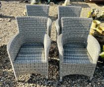 A SET OF 4 MODERN GREY RATTAN GARDEN CHAIRS.