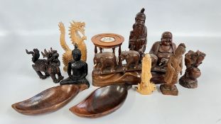 A GROUP OF CARVED AND RESIN SCULPTURES TO INCLUDE A DRAGON, FOO DOG, BUDDHAS,