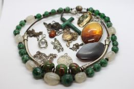 A GROUP OF PENDANT NECKLACES TO INCLUDE AMBER TYPE,
